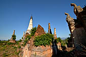 Inle Lake Myanmar. Indein, a cluster of ancient stupas  ruined and overgrown with bushes, just behind the village. 